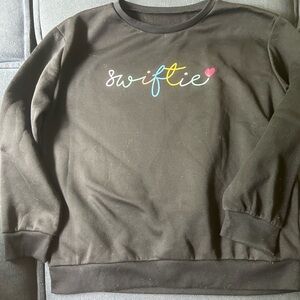 Temu swiftie sweater fits like a L